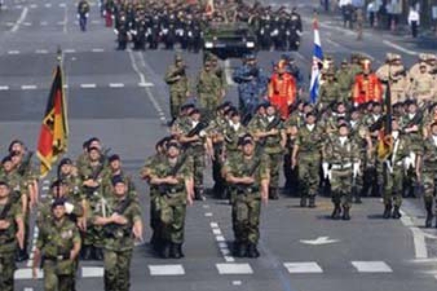 France marks Bastille Day in aftermath of train crash