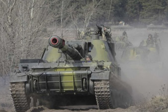 Меркель: Путин отводит часть войск от границы с Украиной