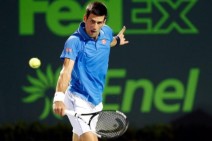 Djokovic through to face Isner in Miami semis