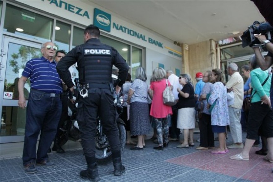 Banks reopen after three-week shutdown. Greece