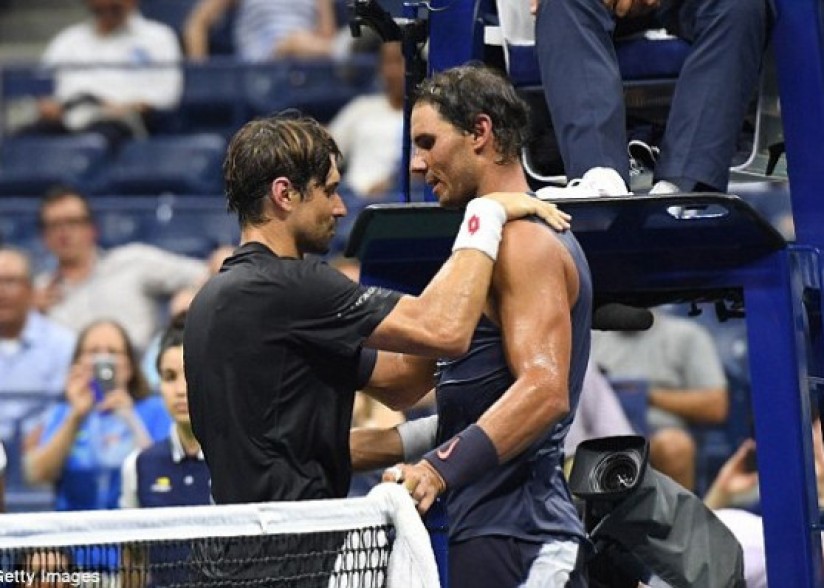 Rafael Nadal reaches US Open second round after David Ferrer retires hurt in his final Grand Slam appearance