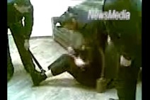 Video showing police officers taking testimonies applying gas masks and batons made ten years ago